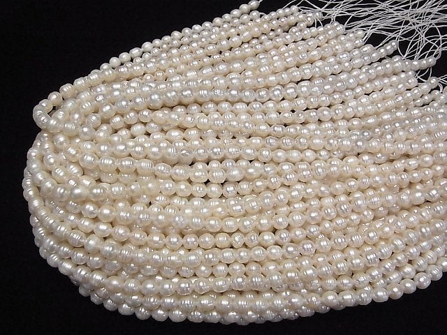 [Video] Fresh Water Pearl AA Wrinkle Rice 7x6x6mm White 1strand beads (aprx.15inch/36cm)