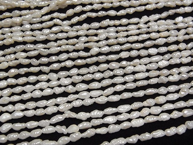 [Video] Fresh Water Pearl Keshi Pearl AA Rice -Baroque 4-5mm White 1strand beads (aprx.14inch/34cm)