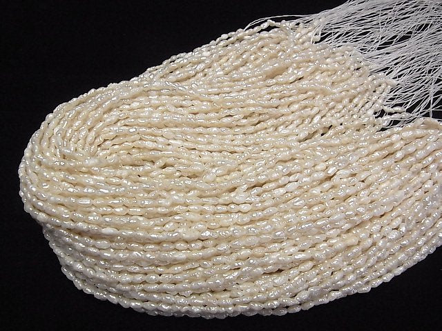 [Video] Fresh Water Pearl Keshi Pearl AA Rice -Baroque 4-5mm White 1strand beads (aprx.14inch/34cm)