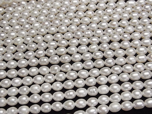 [Video] Fresh Water Pearl AA++ Rice 7x5.5x5.5mm White 1strand beads (aprx.15inch/37cm)