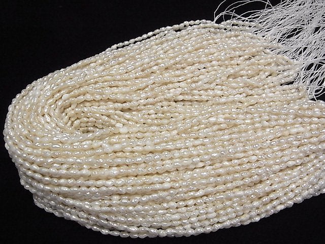 [Video] Fresh Water Pearl AA Rice 5x3x3mm White 1strand beads (aprx.14inch/34cm)