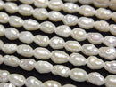 [Video] Fresh Water Pearl AA Baroque-Rice 5-5.5mm White 1strand beads (aprx.15inch/36cm)