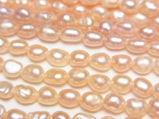 [Video] Fresh Water Pearl AA Rice 5x3.5x3.5mm Natural Orange Pink 1strand beads (aprx.13inch/33cm)