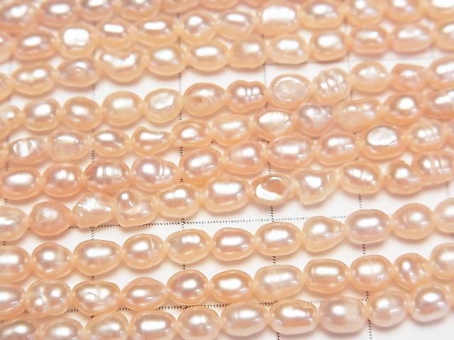 [Video] Fresh Water Pearl AA Rice 5x3.5x3.5mm Natural Orange Pink 1strand beads (aprx.13inch/33cm)