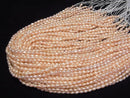 [Video] Fresh Water Pearl AA Rice 5x3.5x3.5mm Natural Orange Pink 1strand beads (aprx.13inch/33cm)