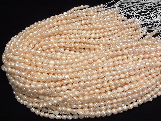 [Video] Fresh Water Pearl AA Rice-Baroque 6x4x4mm Natural Light Orange 1strand beads (approx. 13inch/32cm)