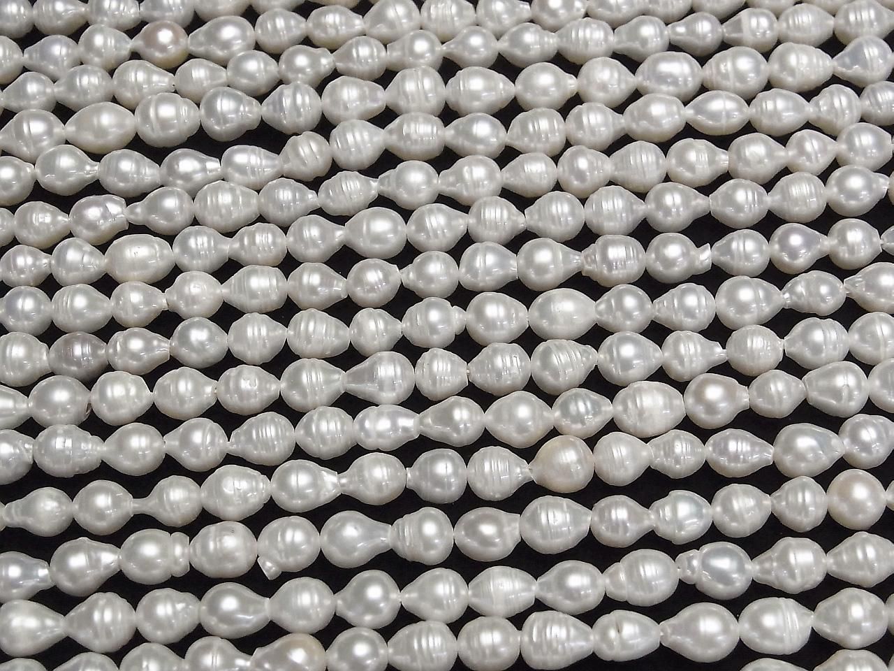 Fresh Water Pearls AA Bands Drop-Rice 7x6x6mm White 1strand beads (approx. 13inch/33cm)
