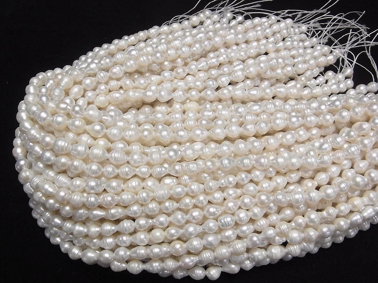 Fresh Water Pearls AA Bands Drop-Rice 7x6x6mm White 1strand beads (approx. 13inch/33cm)