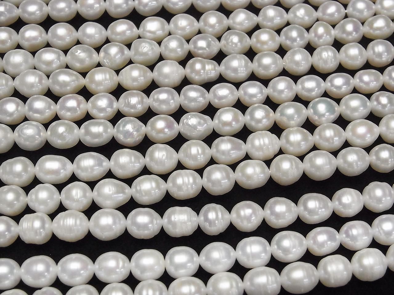 Fresh Water Pearls AA Rice-Baroque 8x7x7mm White 1strand beads (approx. 15inch/37cm)