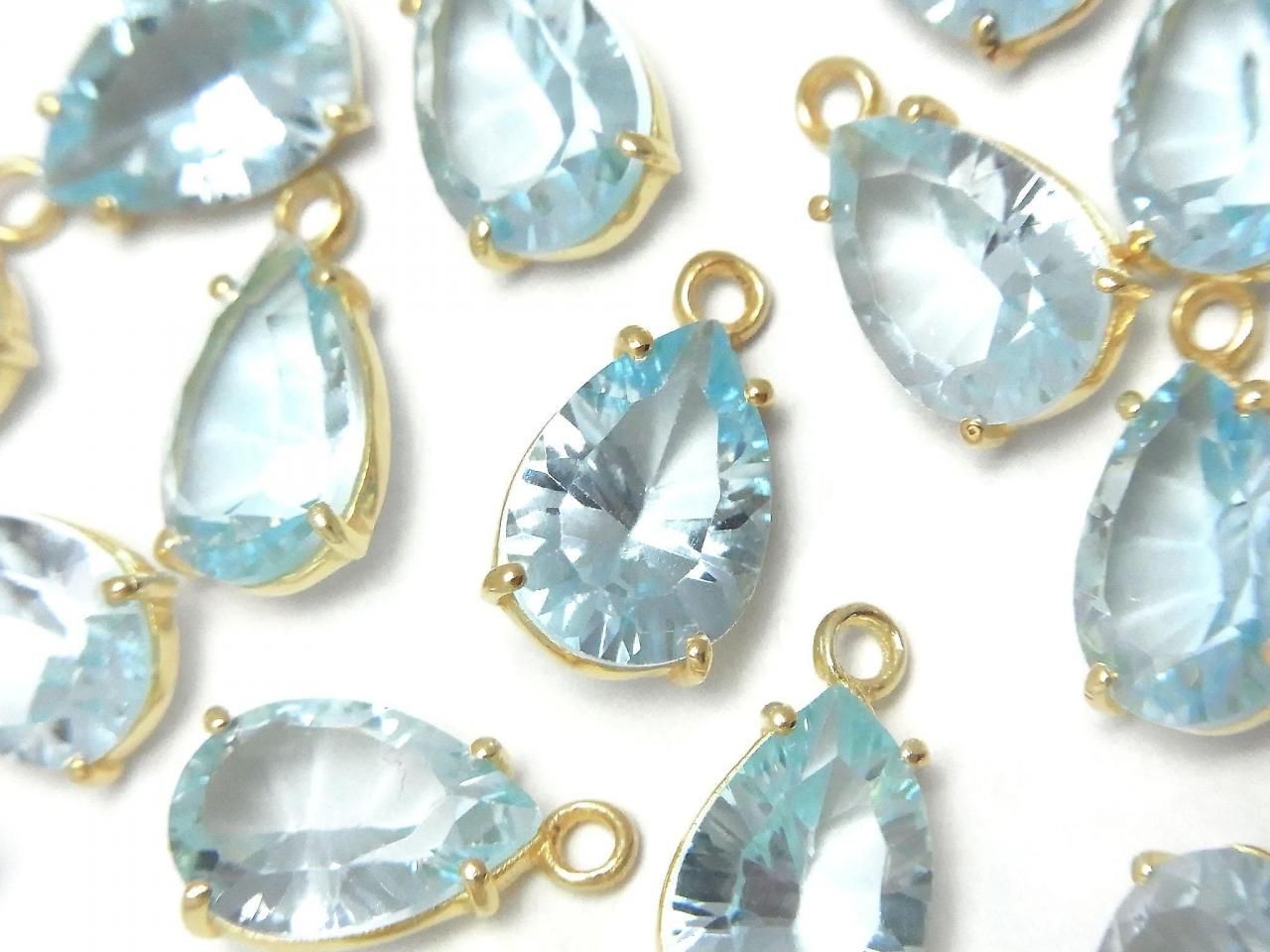 High Quality Sky Blue Topaz AAA Bezel Setting Pear Shape Concave Cut 12x8mm 18KGP 1pc