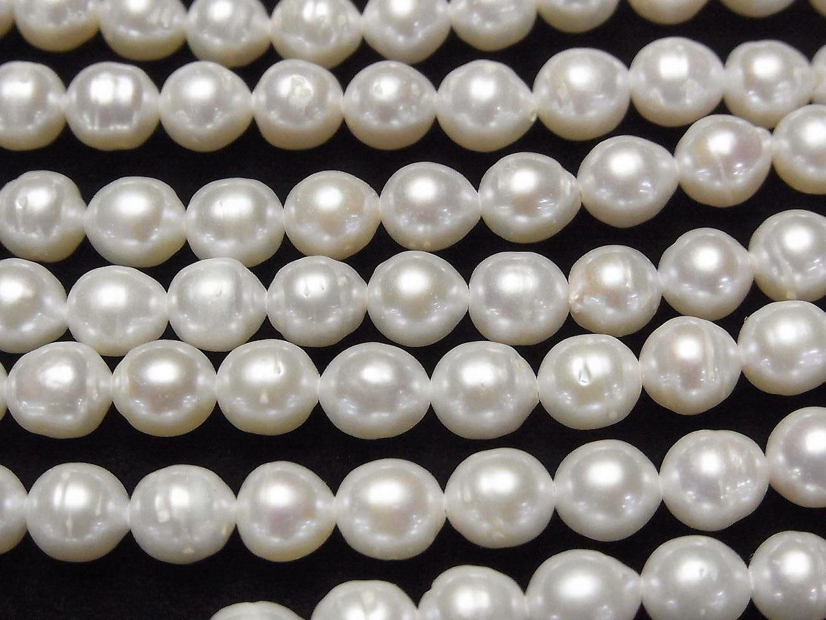 Fresh Water Pearl AA+ Rice Drop 7x6x6mm White 1strand beads (approx. 15inch/37cm)