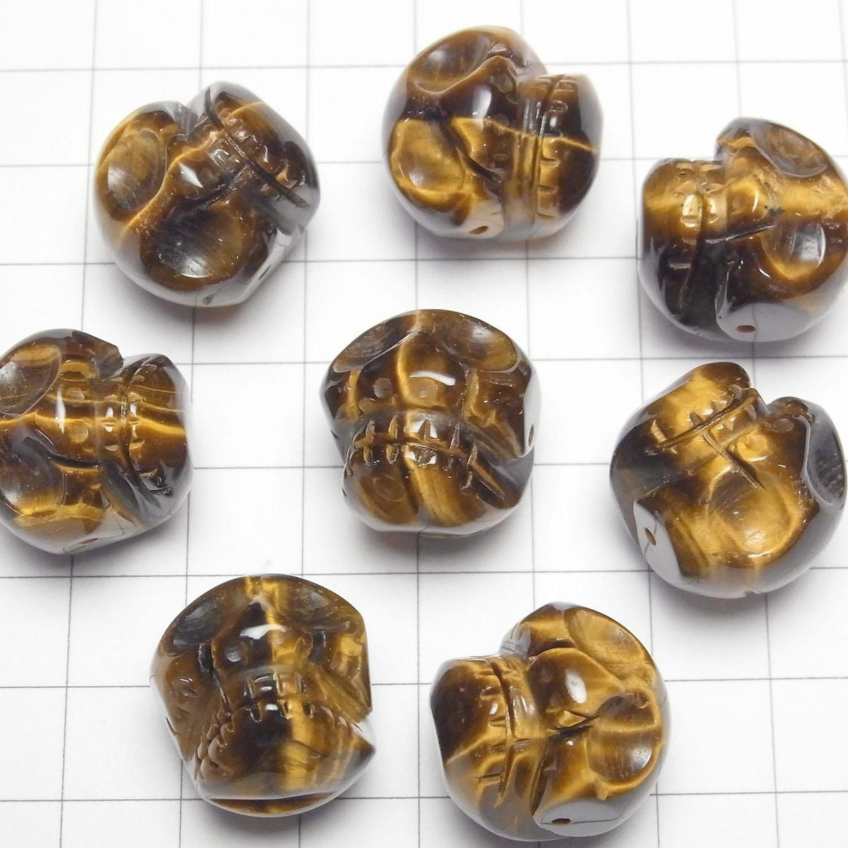 Yellow Tiger's Eye AAA- Skull with 20mm side hole 1 piece