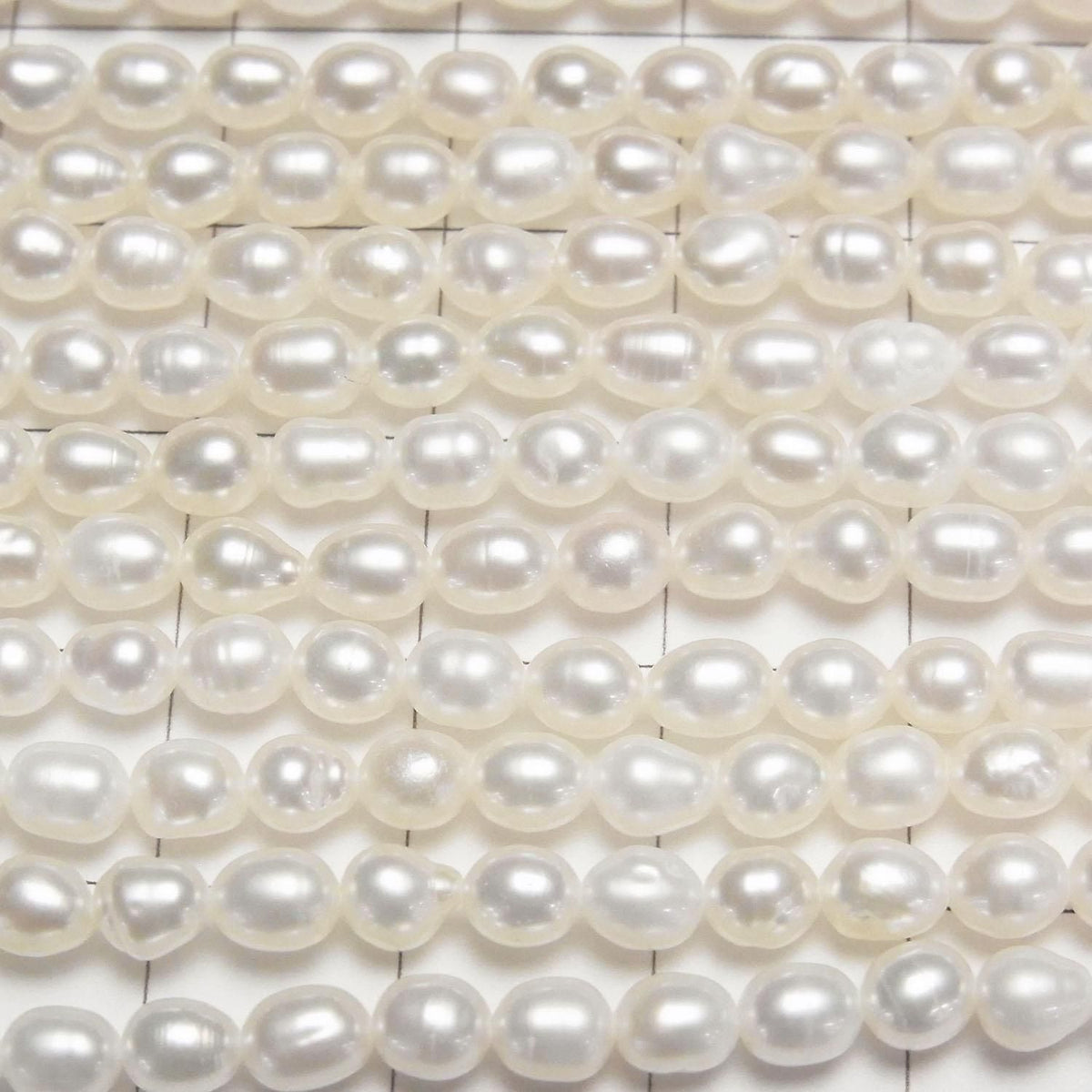 Fresh Water Pearl AA+ Rice 5x4x4mm White 1strand beads (approx. 13inch/33cm)