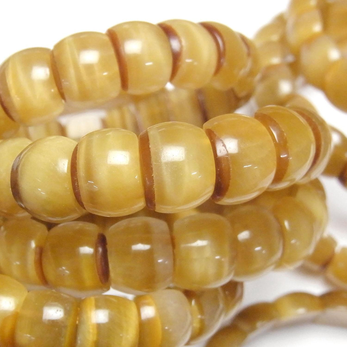 Golden Tiger's Eye AA++ 2-Hole Oval 14x10x6mm 1strand beads (Bangle Bracelet)