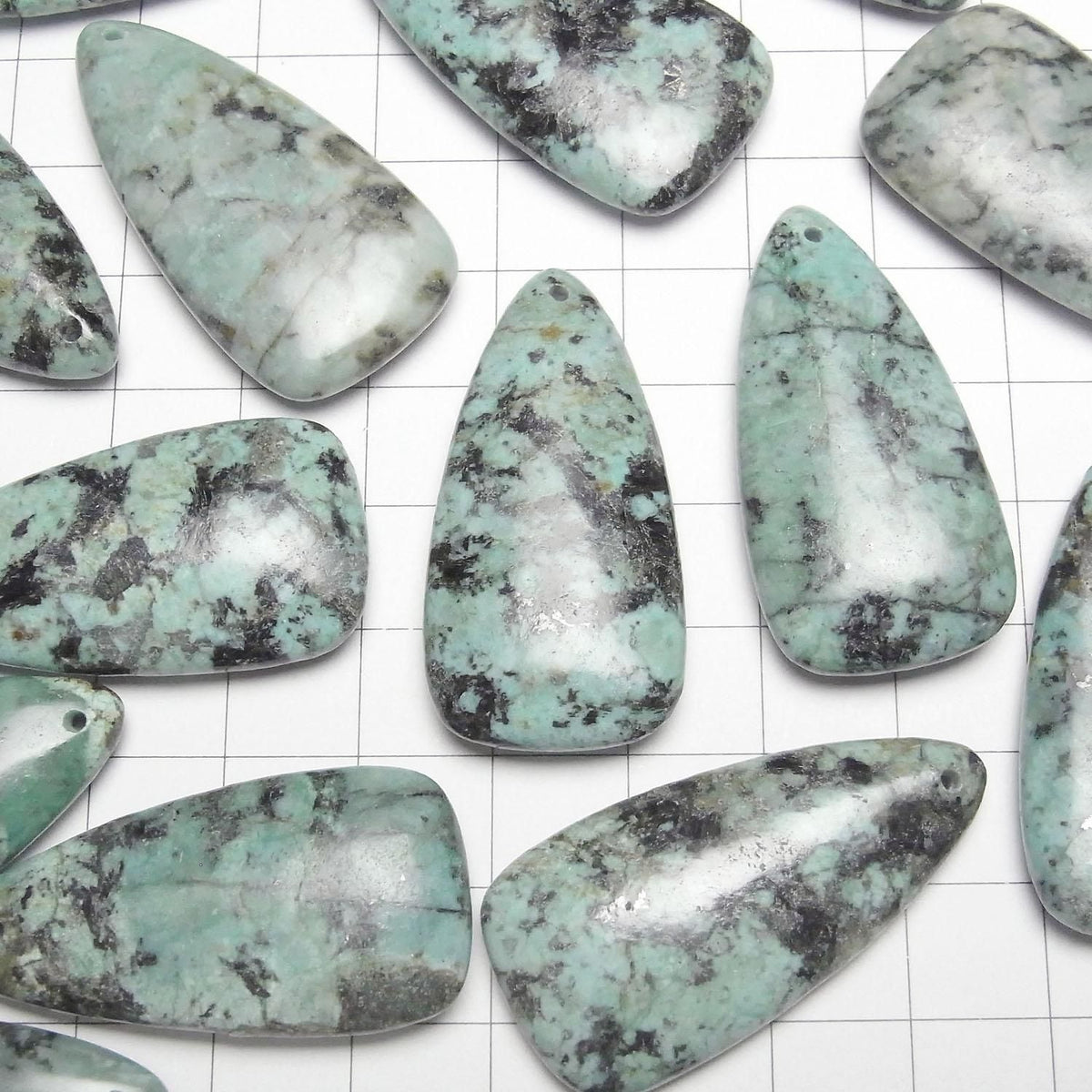 African Turquoise deformed pear shape 40x20mm 1pc