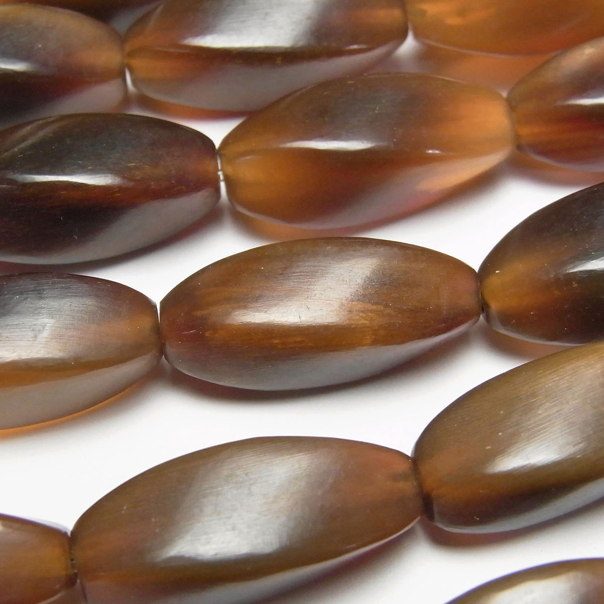 Buffalo Horn 4 Faceted Twist Faceted Rice 25 x 10 x 10 Brown half or 1strand beads (aprx.15 inch / 38 cm)