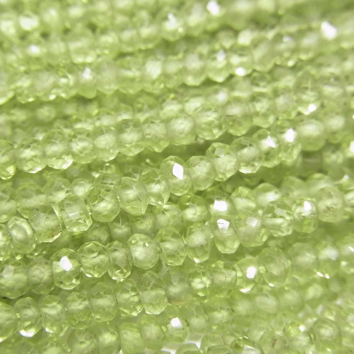 High Quality Peridot AAA--AA++ Faceted Button Rondelle 1strand beads (aprx.13inch/32cm)