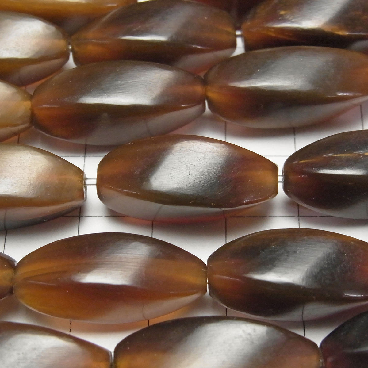 Buffalo Horn 4 Faceted Twist Faceted Rice 25 x 10 x 10 Brown half or 1strand beads (aprx.15 inch / 38 cm)