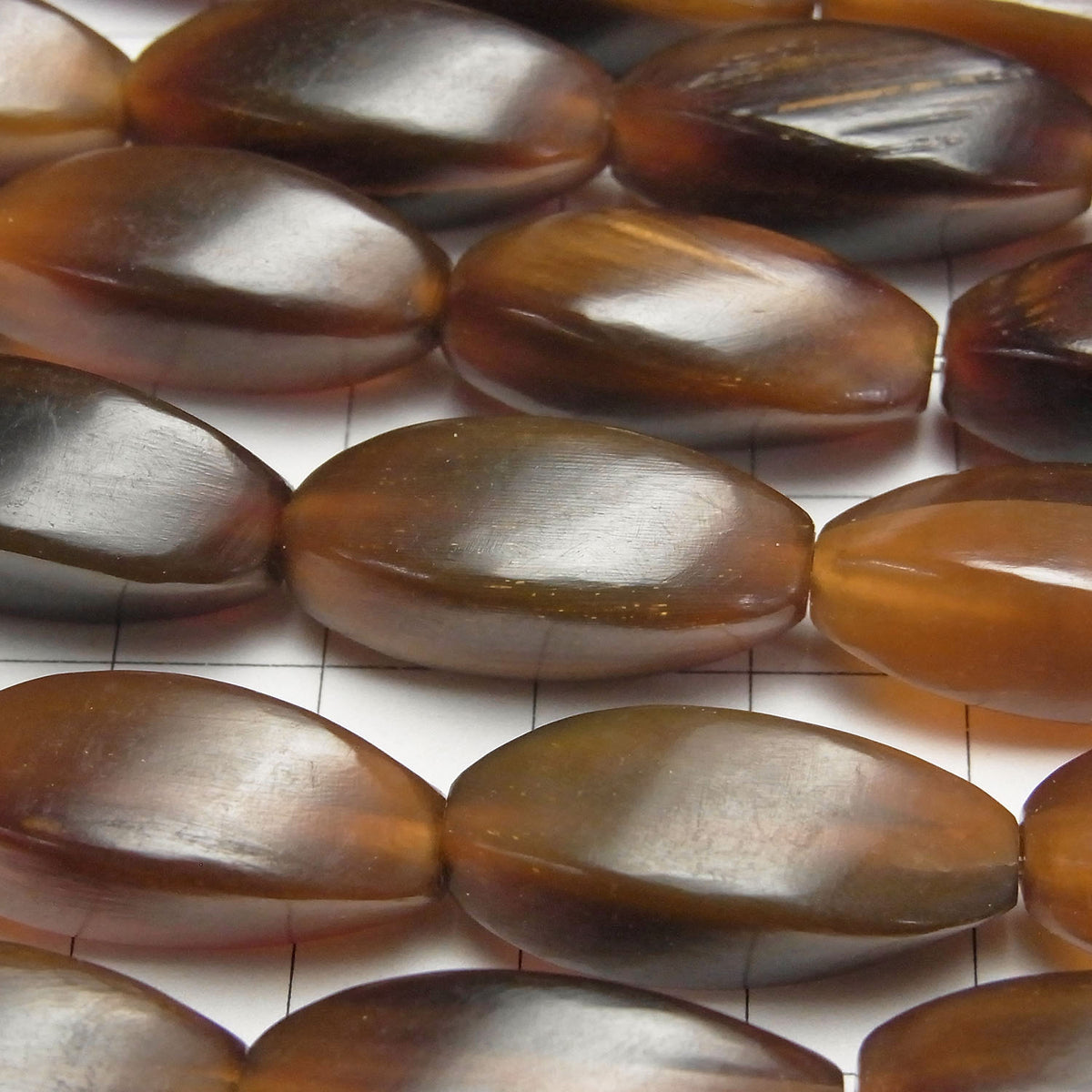 Buffalo Horn 4 Faceted Twist Faceted Rice 25 x 10 x 10 Brown half or 1strand beads (aprx.15 inch / 38 cm)