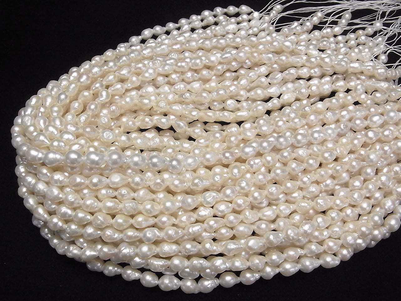 Fresh Water Pearl AA Natural Drop 7x6x6mm White 1strand beads (aprx.14inch/35cm)
