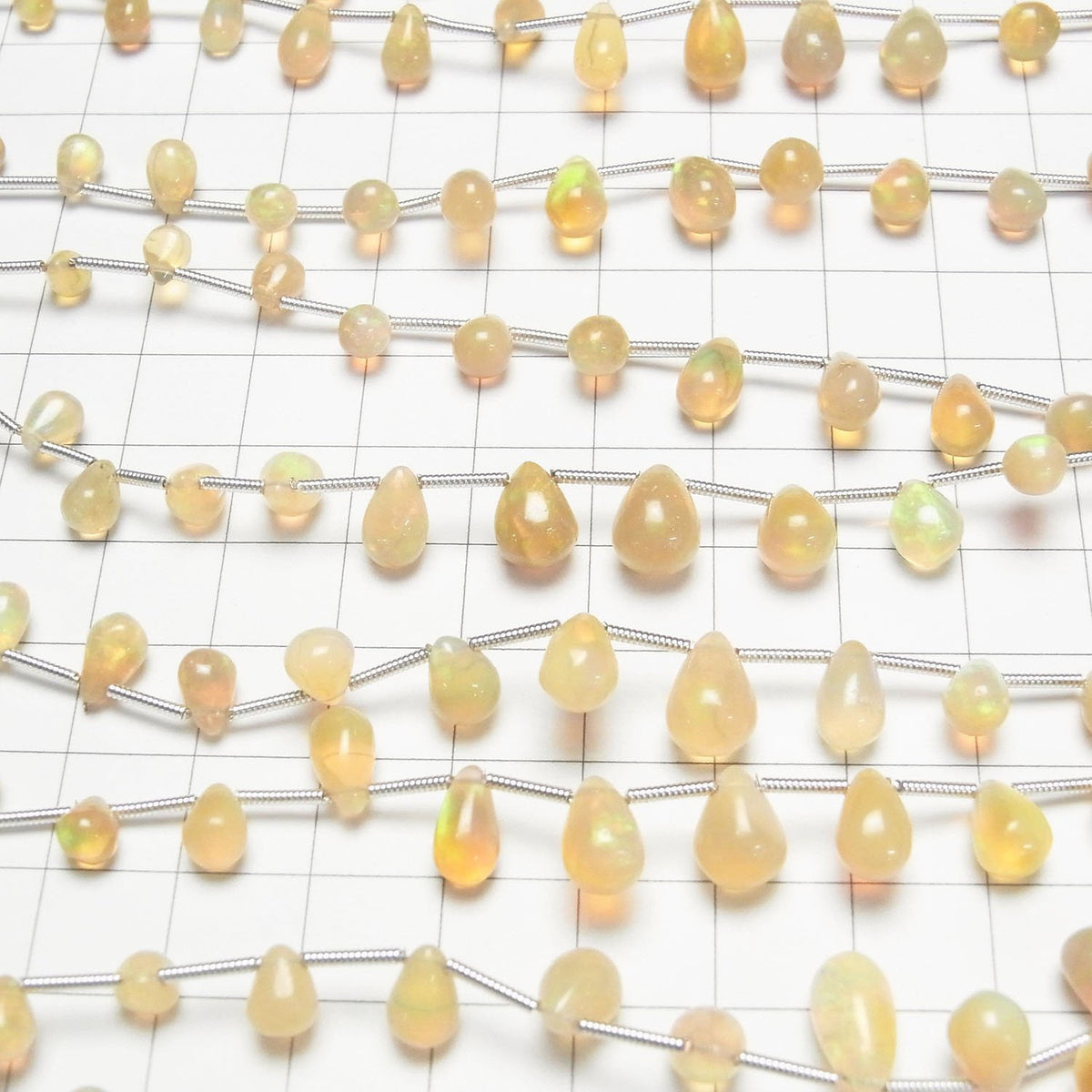 Opale Éthiopienne de haute qualité AA++ Goutte (Lisse) Demi-fil ou 1 fil de perles (18 pièces)