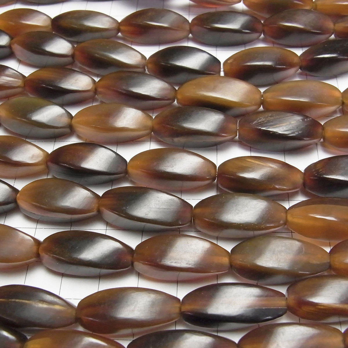 Buffalo Horn 4 Faceted Twist Faceted Rice 25 x 10 x 10 Brown half or 1strand beads (aprx.15 inch / 38 cm)