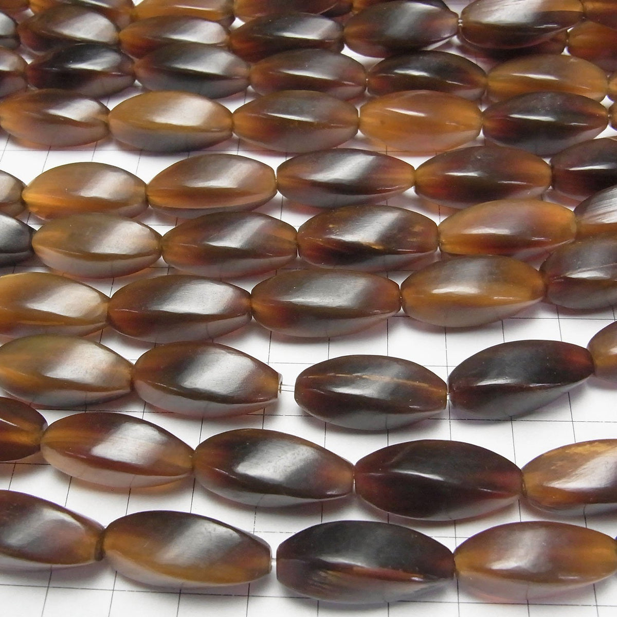Buffalo Horn 4 Faceted Twist Faceted Rice 25 x 10 x 10 Brown half or 1strand beads (aprx.15 inch / 38 cm)