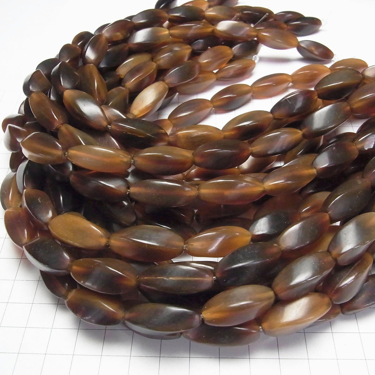 Buffalo Horn 4 Faceted Twist Faceted Rice 25 x 10 x 10 Brown half or 1strand beads (aprx.15 inch / 38 cm)
