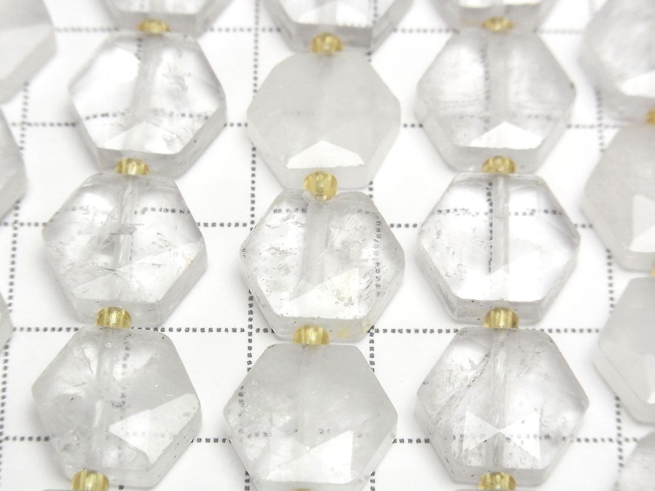 Perles de quartz cristal AA+ taille hexagonale 12x13mm 1 fil (env. 38cm)