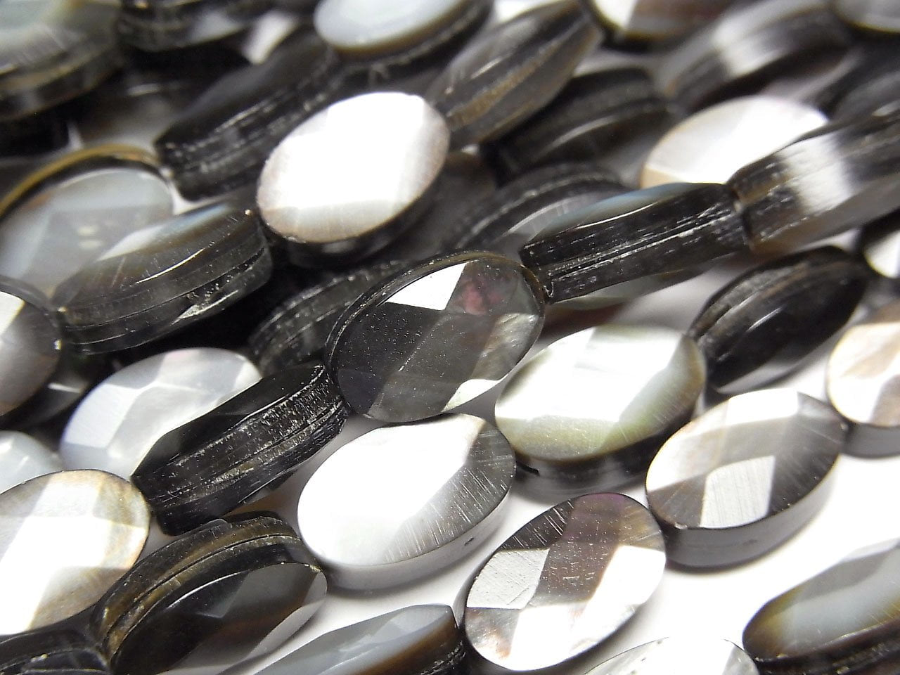 Black Shell (Black-lip Oyster) AAA Faceted Oval 10 x 6 x 4 mm half or 1strand beads (aprx.15 inch / 38 cm)