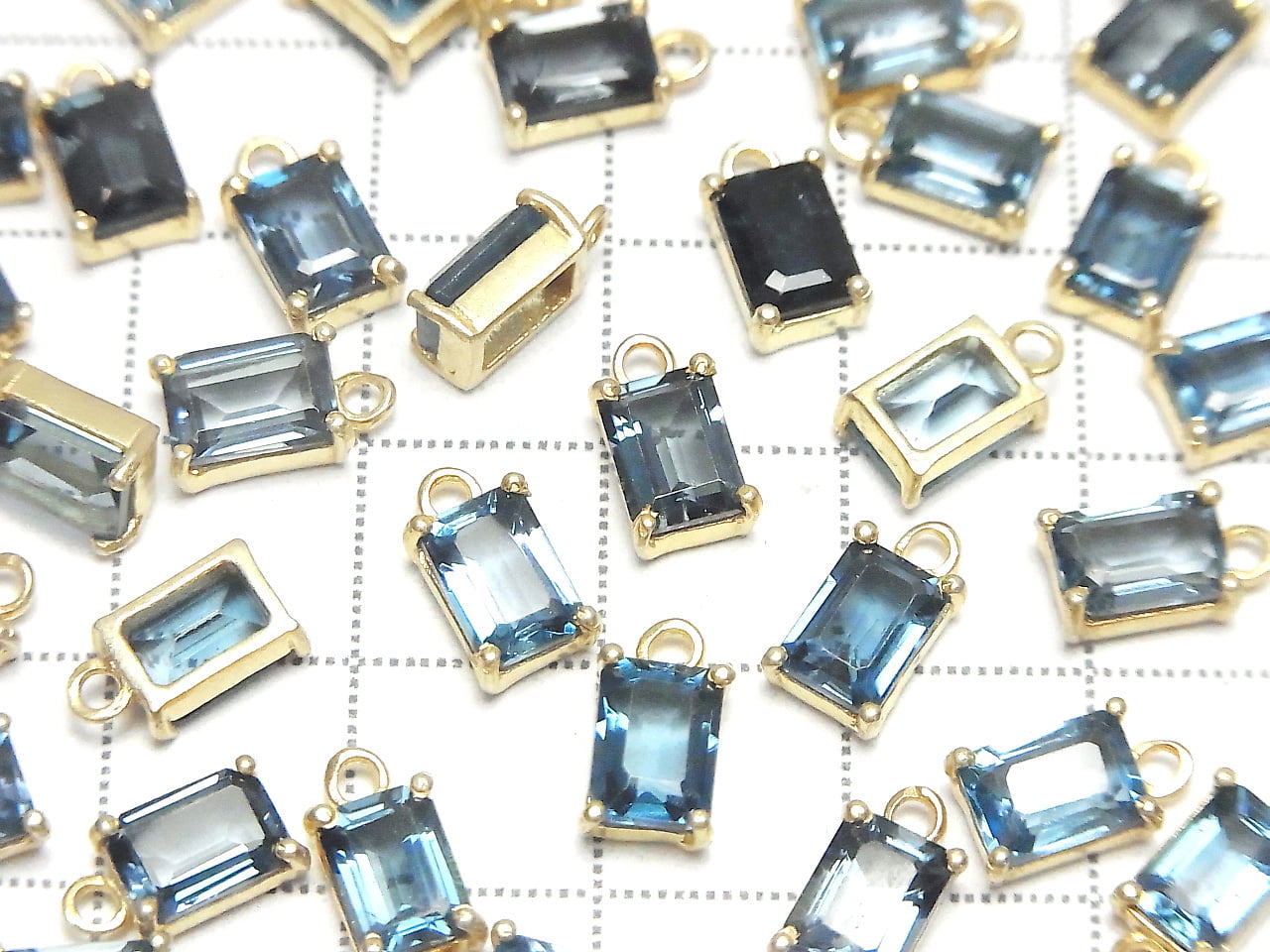 Topaze bleue de Londres de haute qualité AAA sertie clos rectangulaire à facettes 7x5mm 18KGP 1pc