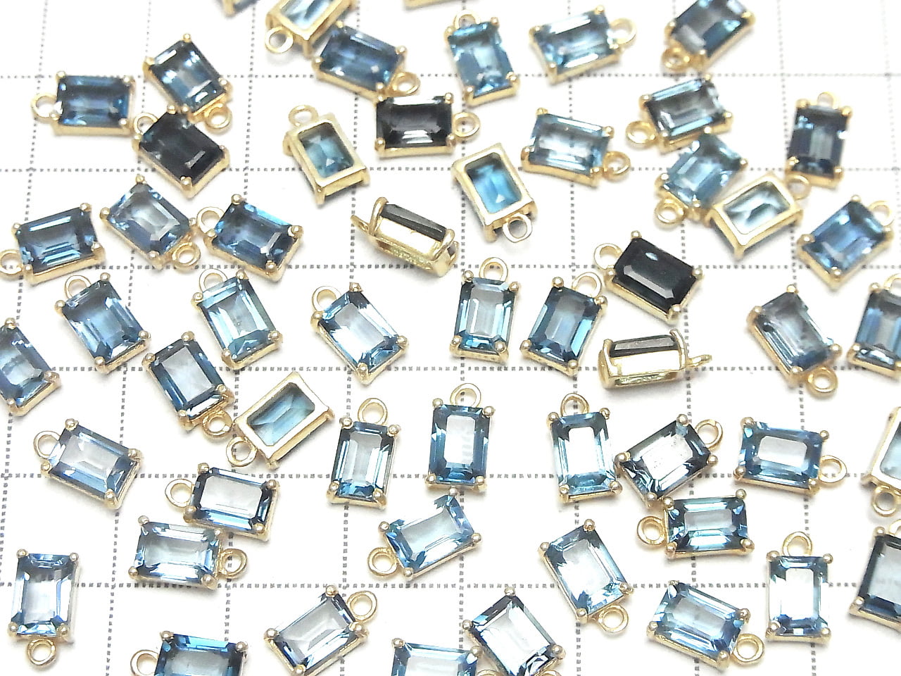 Topaze bleue de Londres de haute qualité AAA sertie clos rectangulaire à facettes 7x5mm 18KGP 1pc