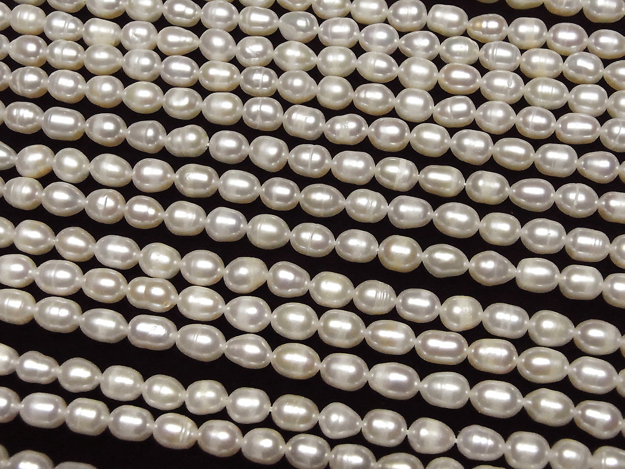 Fresh Water Pearl AA Wrinkle Rice 7x5x5mm White 1strand beads (approx. 13 inches/33 cm)