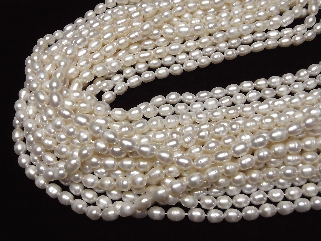 Fresh Water Pearl AA Wrinkle Rice 7x5x5mm White 1strand beads (approx. 13 inches/33 cm)