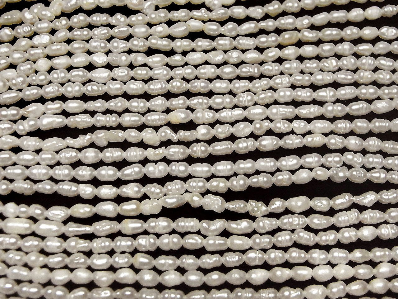 Perles d'eau douce AA en forme de grain de riz, 4x3x3mm, blanches, 1 brin (environ 13 pouces/33 cm)