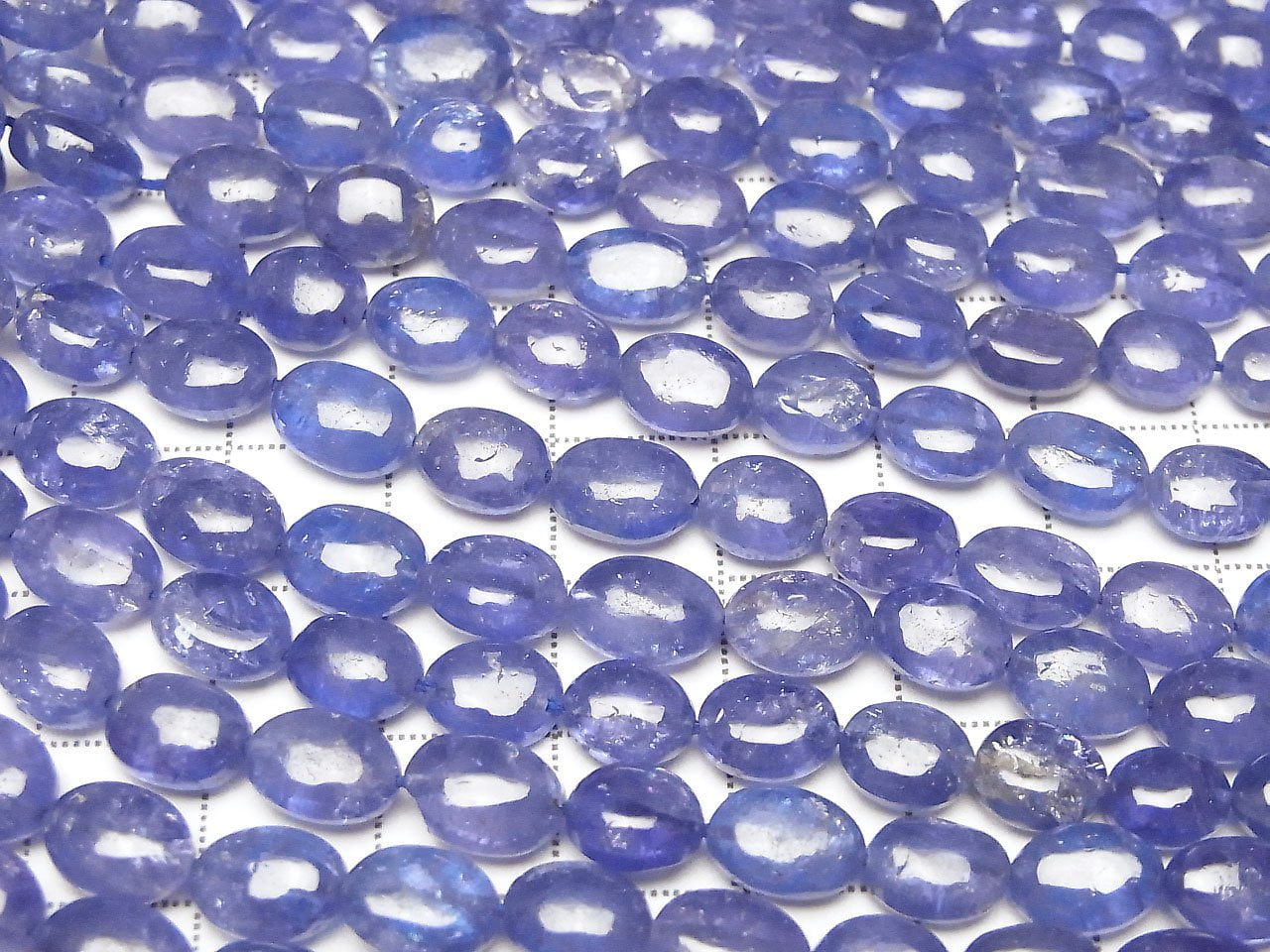 Perles un fil Tanzanite AAA Ovale de haute qualité (environ 15 pouces/36 cm)