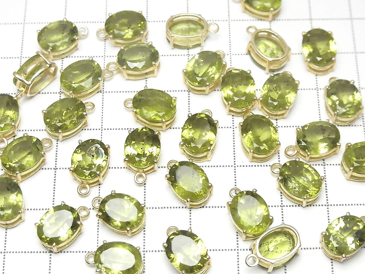 Péridot de haute qualité AAA serti clos ovale facetté 10x8mm 18KGP 1 pièce