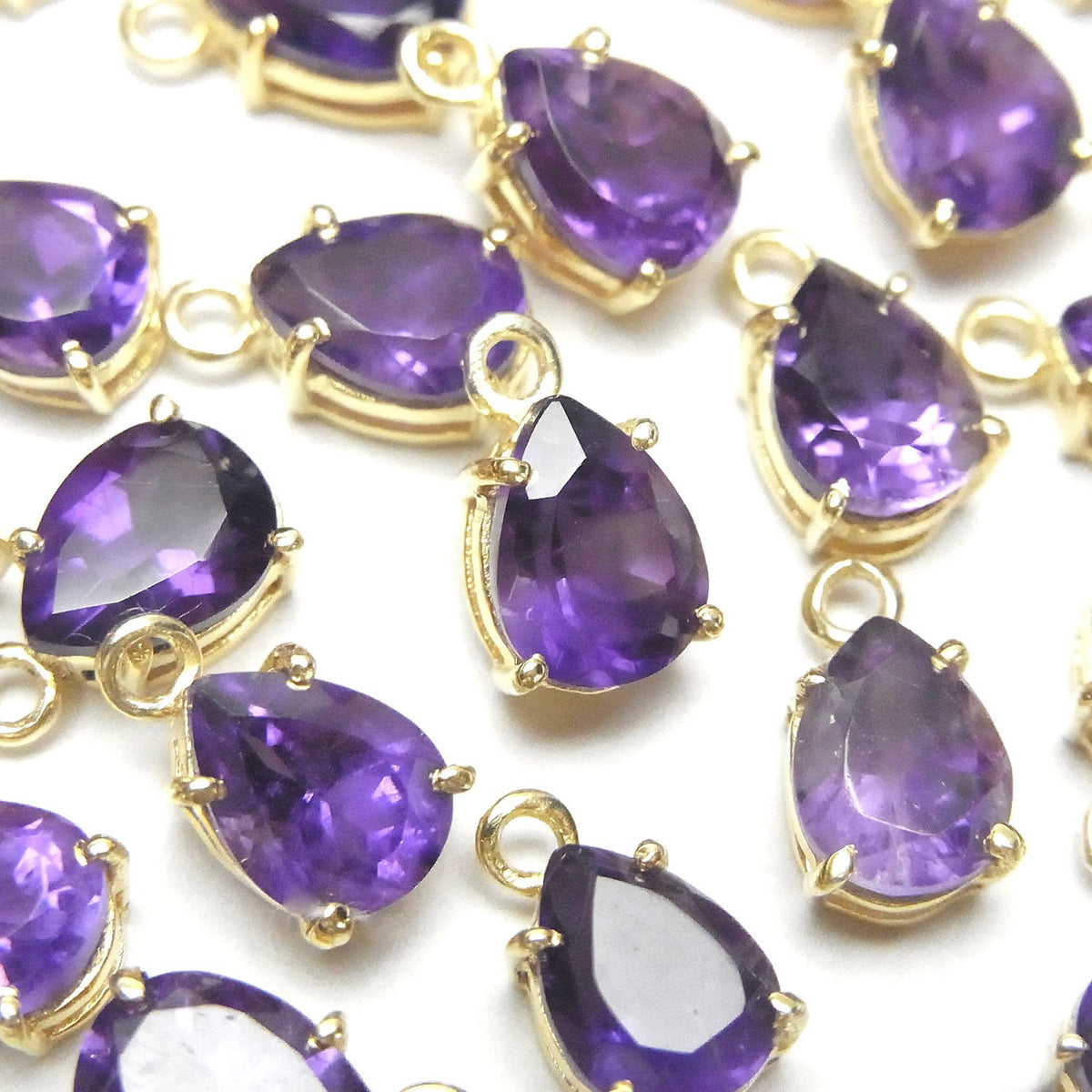 Hochwertiger Amethyst AAA Zargenfassung Birnenform facettiert 8x6mm 18KGP 2Stück