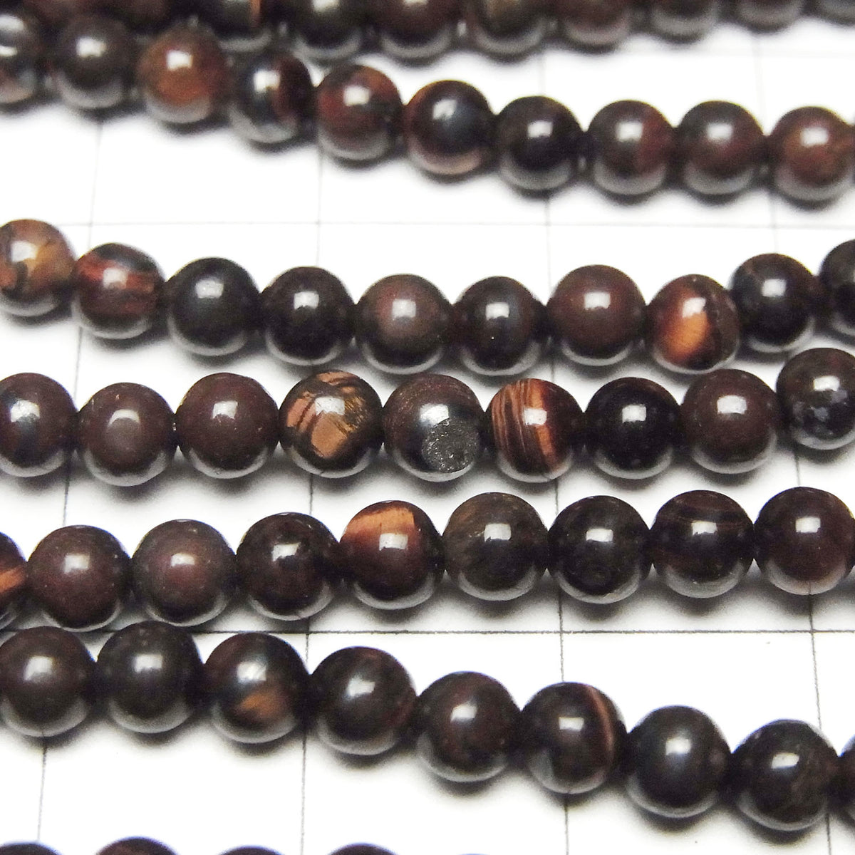 Perles rondes Œil de Tigre en Fer 4mm 1 fil (env. 38cm)