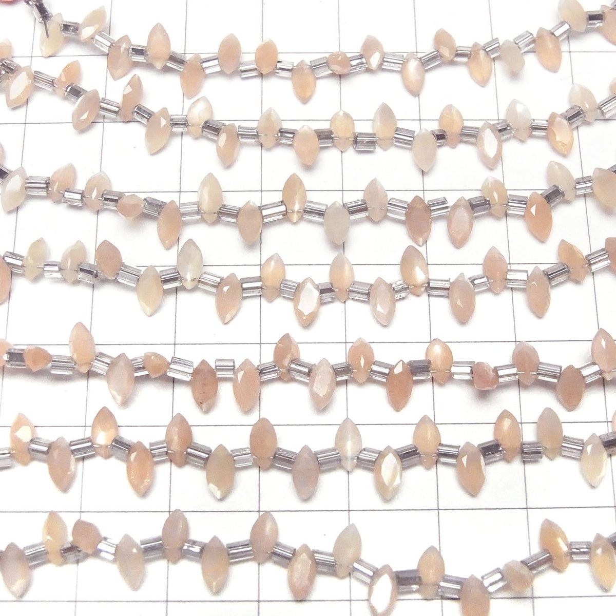 高品質桃月光石AA++ 馬眼形刻面 6x3毫米 1串珠子 (18顆)