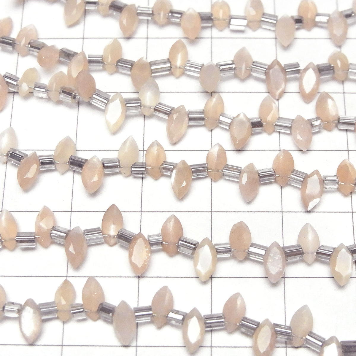高品質桃月光石AA++ 馬眼形刻面 6x3毫米 1串珠子 (18顆)