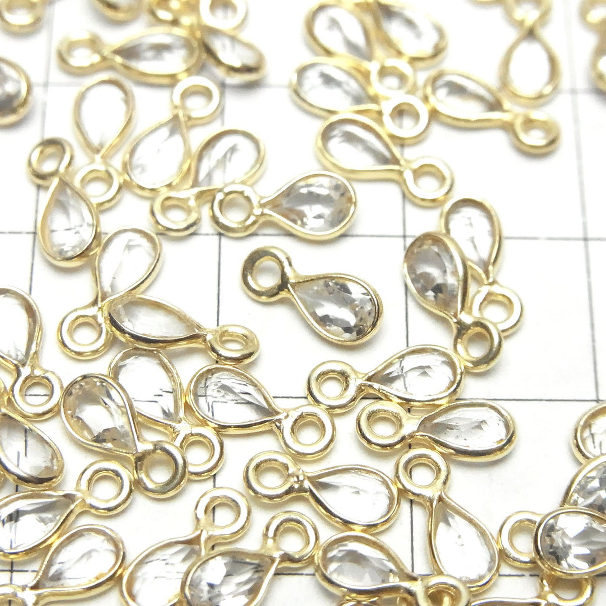 高品質白色拓帕石 AAA 級 - 梨形刻面爪鑲 6x4mm 18KGP 5件