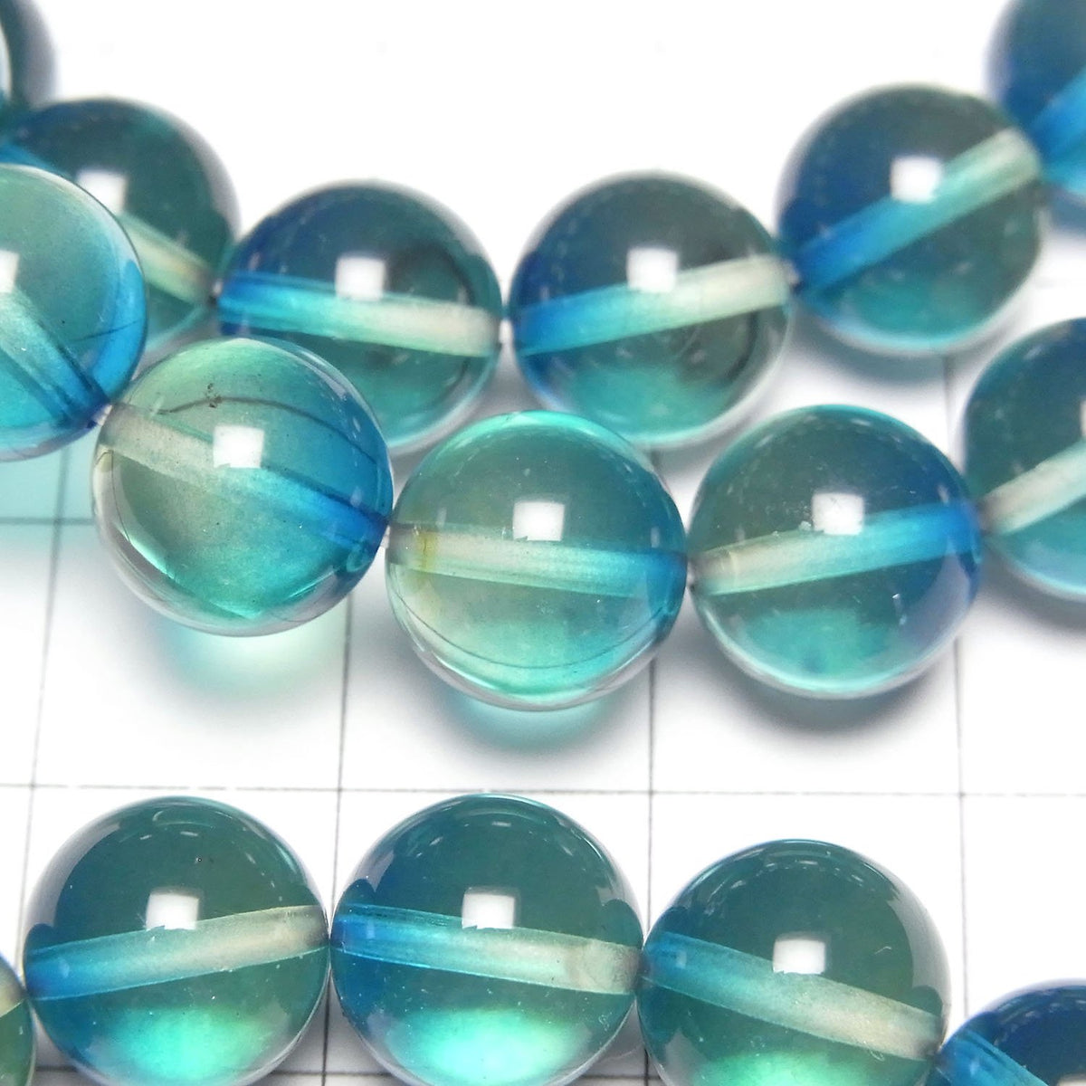 Perles rondes de 10 mm de couleur ambre bleu-vert 1 fil (bracelet)