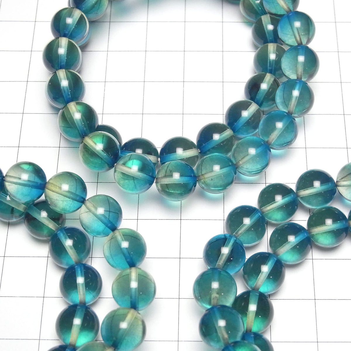 Perles rondes de 10 mm de couleur ambre bleu-vert 1 fil (bracelet)