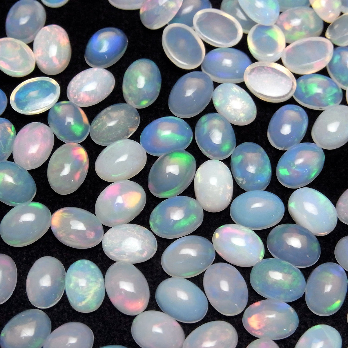 Hochwertiger Äthiopischer Opal AAA Oval Cabochon 7x5mm 3 Stück
